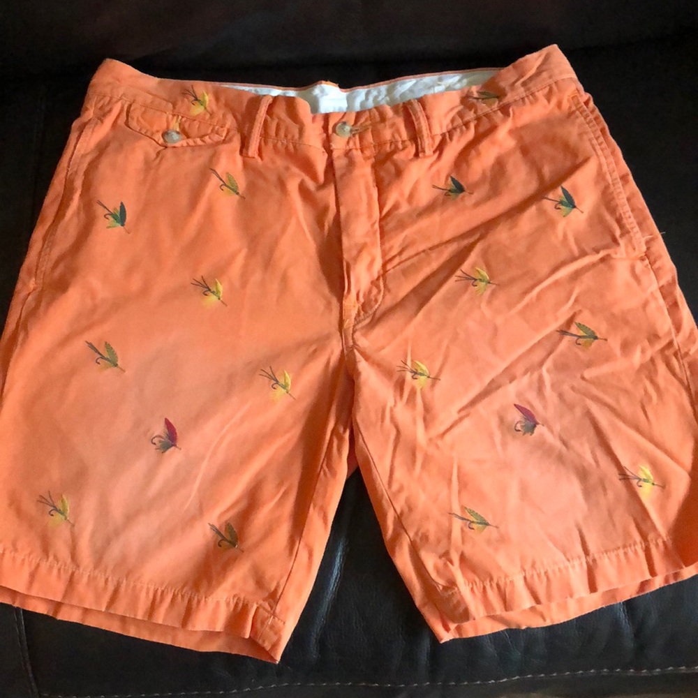 Orange polo by Ralph Lauren shorts